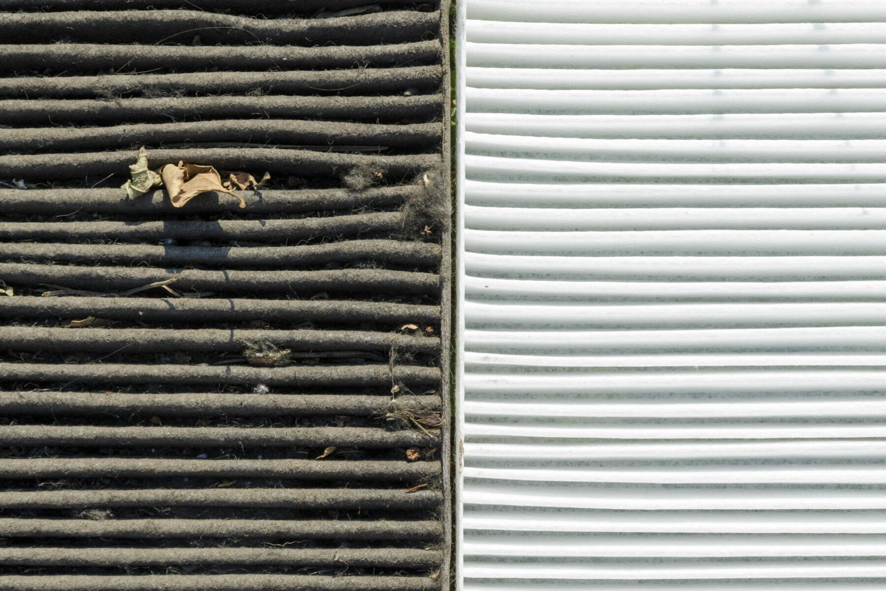 half by half fragments of dirty and clean air filters