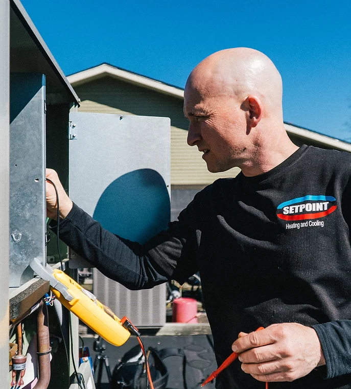 Terry Ellison working on an HVAC unit